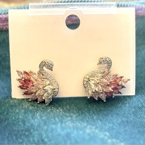 NWOT Swan post earrings with silver, purple ab Rhinestones.
